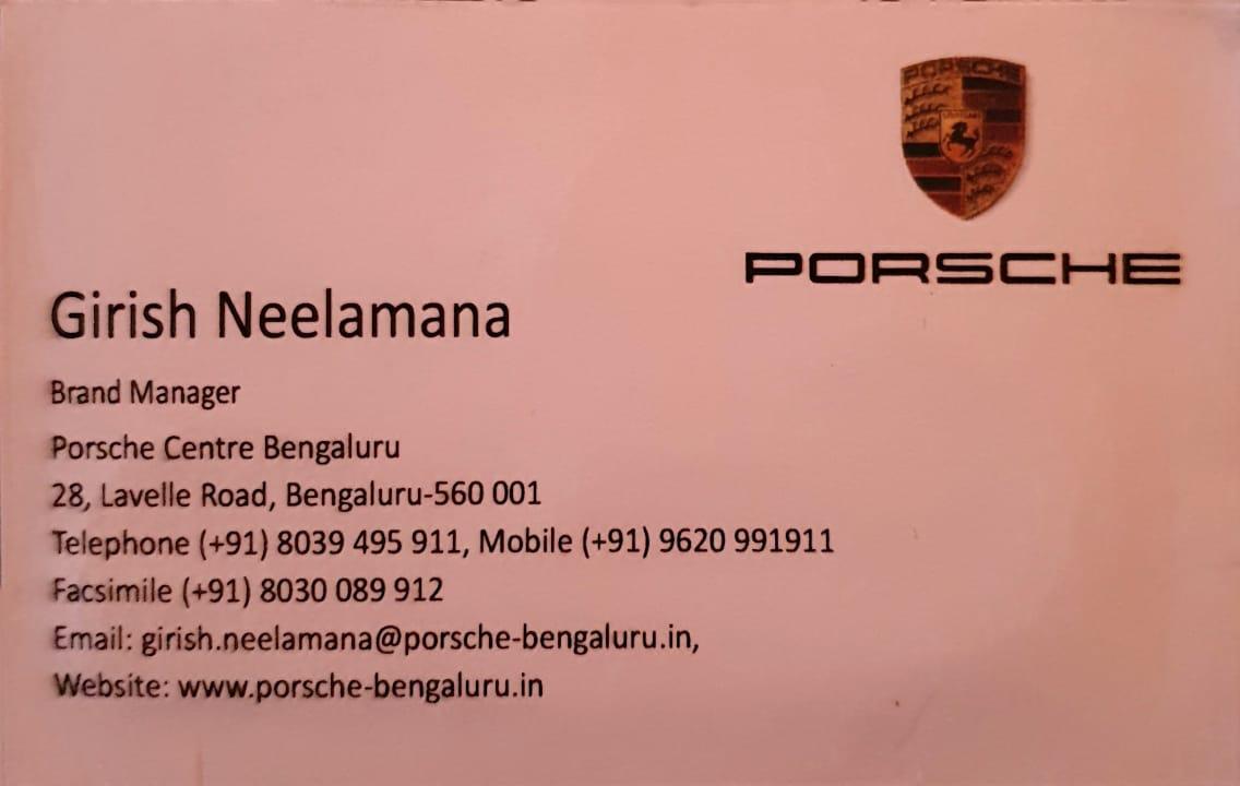 Porsche business card from Girish Neelamana's career